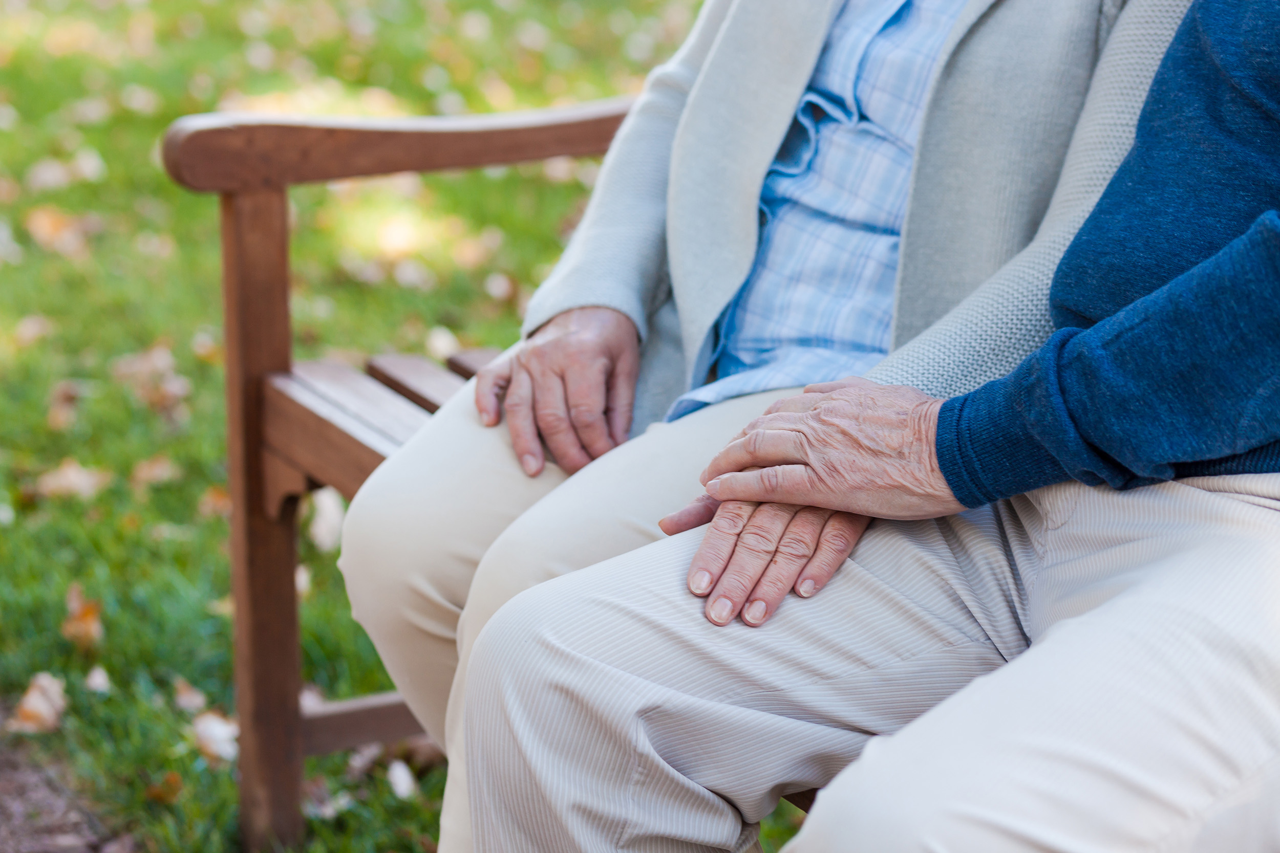 Elderly couple on bench